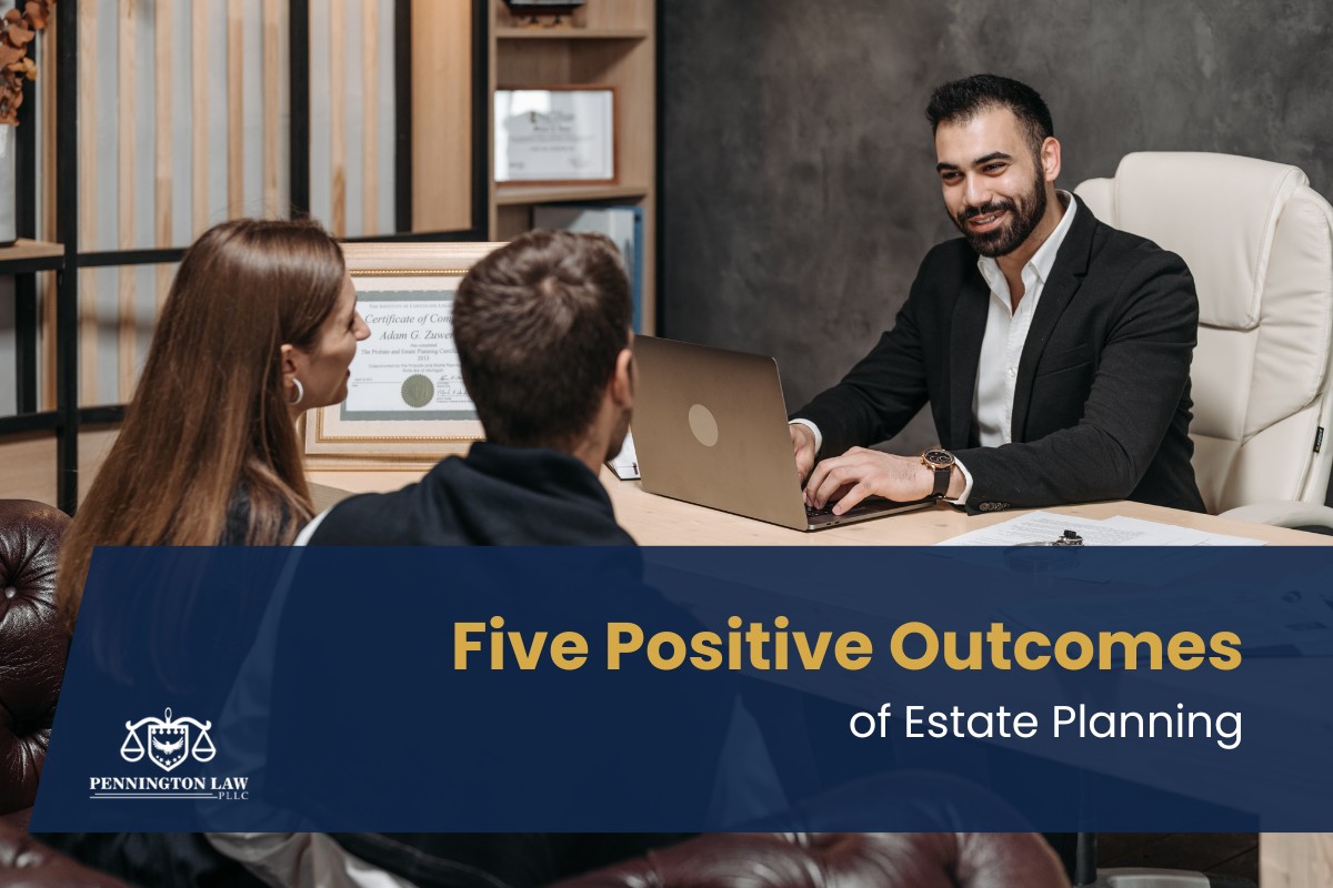 A couple consulting with an attorney in his office